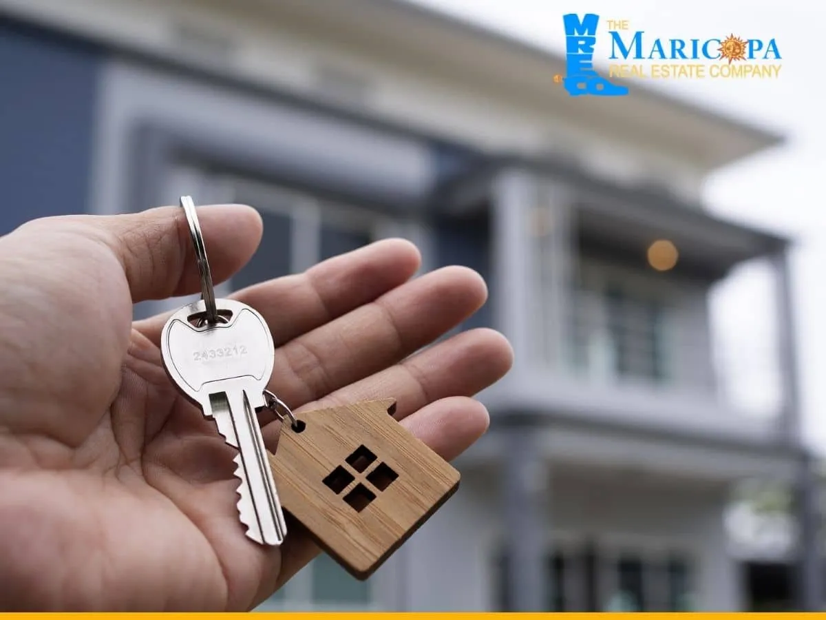 landlord giving key house to buyer