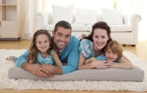 family in new home in desert cedars