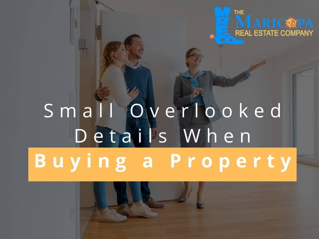 Realtor showing house to a young couple wanting to Buying