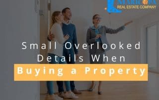 Realtor showing house to a young couple wanting to Buying